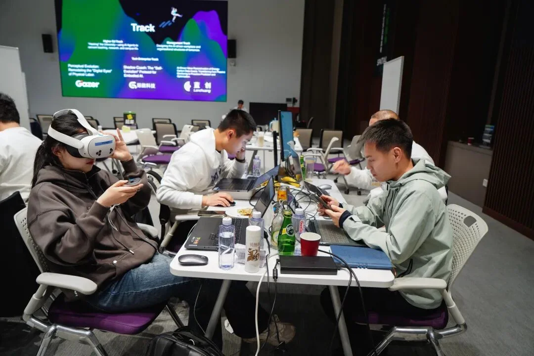 A team developing a spatial product with VR and laptops